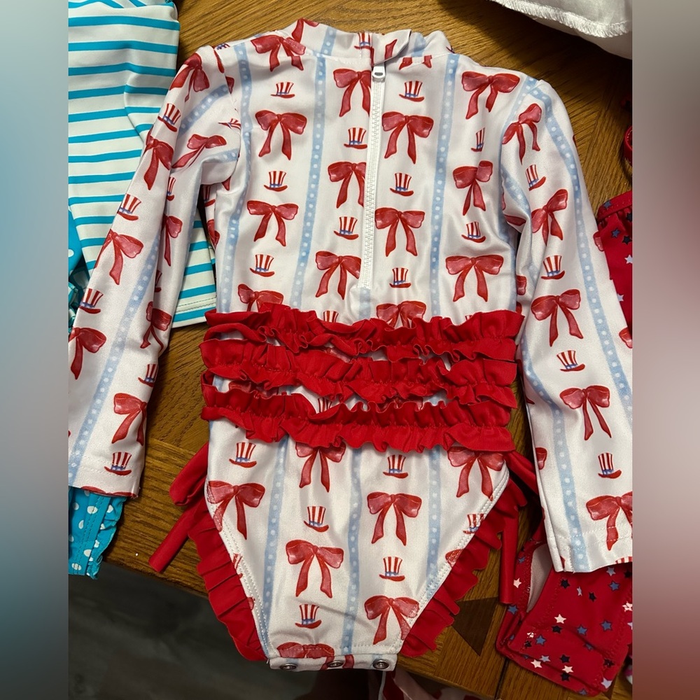 18 month Swim suit. Red, white, and blue, excellent condition